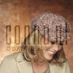 25-01-2005 Antje Monteiro at studio in Amsterdam, January 25, 2005.

[keywords]Posed, Headshot, Laughing, Cap[/keywords]